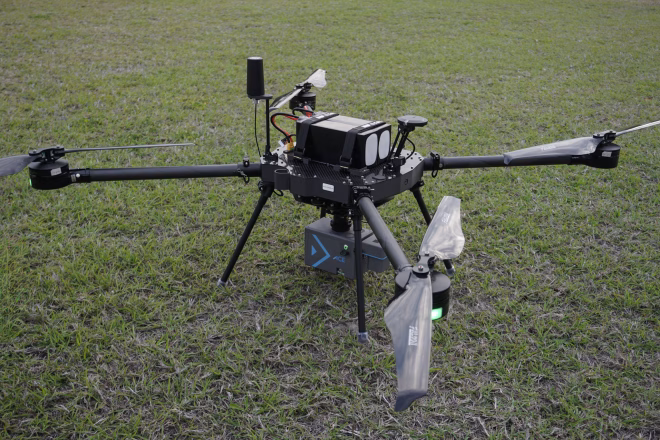 Front view of the X4 Evolution Flight drone on lawn
